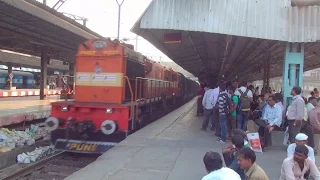 Super Luxurious Deccan Odyssey Glittering Past Crowded Dadar station, Mumbai