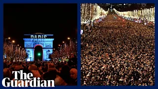 More than 1m people gather in Paris to watch New Year's Eve firework display