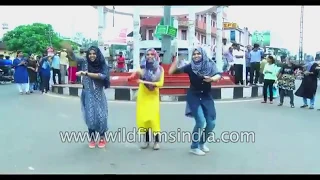 South Indian girls dance as a Flash mob in Kerala - we couldn't use Gangnam Style music, though!