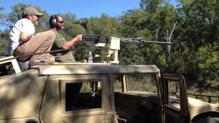 Firing a full auto M2HB mounted to a humvee slantback