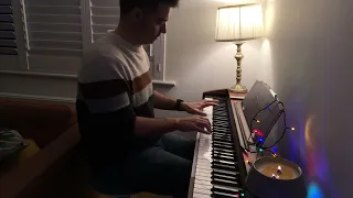 Playing ‘Escape From New York’ theme on piano. John Carpenter