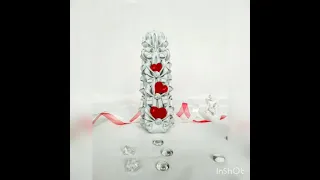 Amazing white carved candles with red red hearts.