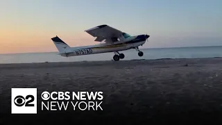 Small plane makes emergency landing on Long Island beach. Watch the video.