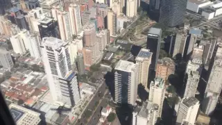 Landing in São Paulo city, Congonhas airport. Flying low over skyscrapers.