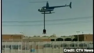 Canadian Prisoners Escape in Helicopter