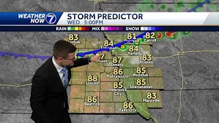 Warm and breezy Wednesday, spot shower chance late