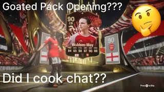 Checking out me squad battles rewards (TOTS pack opening)