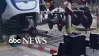 Woman narrowly escapes being hit by a train | #shorts | ABC News