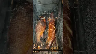 Smoked pike on the fire