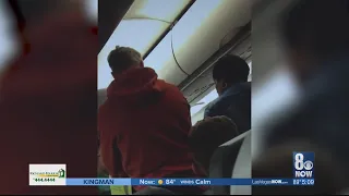 Video of local woman getting kicked off Frontier Airlines flight goes viral