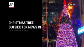 Christmas tree outside Fox News in NY set afire