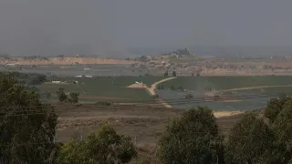 Israeli military bulldozers and a tank roll into northern Gaza | AFP