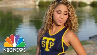 Cheerleader shot after friend approached wrong car in grocery lot