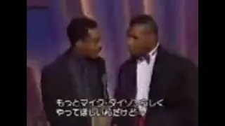 Eddie Murphy doing his Mike Tyson impression in front of Mike