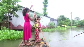 Marooned flood victims await relief in northeast India