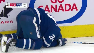 Auston Matthews down after a knee to the head by Pesce