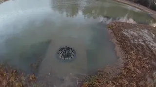 Clearing the Pond Drain after Heavy Rain