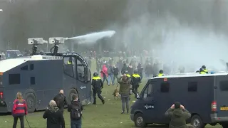 Clashes as police break up anti-government protest on eve of Dutch elections | AFP