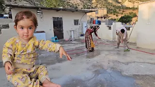 Eshg Khosrow Diana cleaning the Hayat Khana