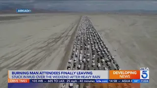 Thousands try to escape the mud at Burning Man festival