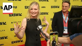 Kirsten Dunst, Wagner Moura and director Alex Garland premiere action drama 'Civil War'