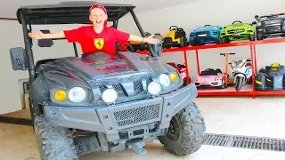 Little driver Ali rides on cars - Huge Toy Car Garage