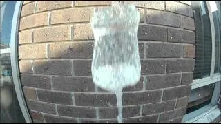 Popping Water Balloons with a pin