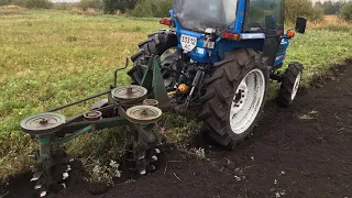 Роторний плуг 2-35 з Японським трактором