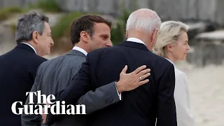 Emmanuel Macron and Joe Biden share a moment after G7 leaders' photo