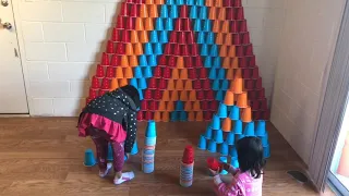 DD Buini make plastic cups pyramid for fun