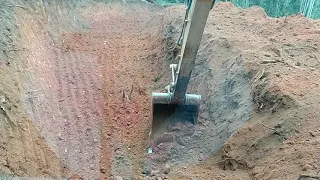 Escavadeira hidráulica CAT 312D operador GALEGO CAPIXABA iniciando uma praça  corte de rampa riscada