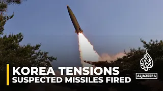 Korea tensions: North Korea fires suspected missiles into sea