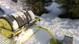 Ivak Compact track setter connected to Ivak 5-tyres SnowRoller in action