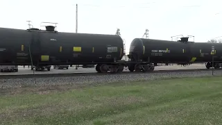 CN Northbound Tanker Train w/ CN 100 Lead & end DPU 4/26/24 Owen, WI