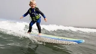 3-year-old surfs in Morro Bay