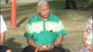 Fijian Prime Minister Frank Bainimarama receives messages from communities in Fiji