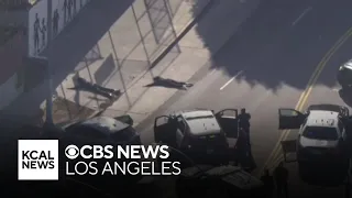 Two suspects were taken into custody after leading LAPD on a pursuit through downtown Los Angeles