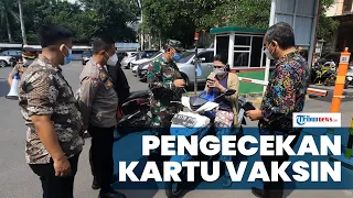 Pengecekan Kartu Vaksin Bagi Pedagang