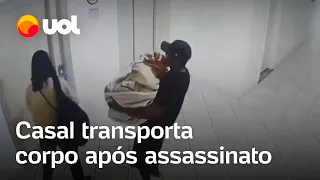 Câmaras mostram casal levando corpo em mala após assassinato; vídeo