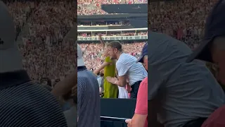 Dan Reynolds and his daughter Arrow at Taylor Swift concert