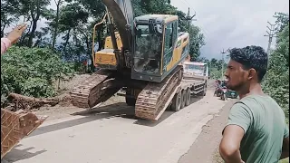 Volvo EC 210 D unloading