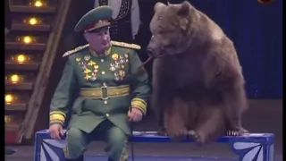 Trained bear with General