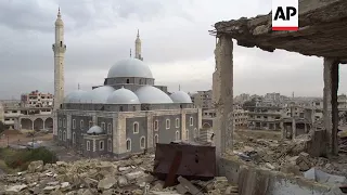 Homs residents begin reconstruction work