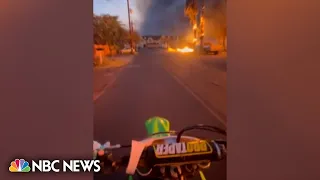 Watch: Motorcycles drive through Lahaina wildfires fleeing flames