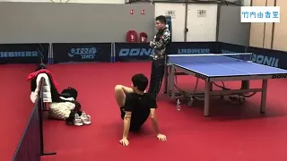 Table Tennis Lin Gaoyuan carefully observing Tomokazu Harimoto during practice