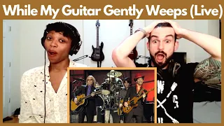 "WHILE MY GUITAR GENTLY WEEPS" AT THE 2004 ROCK AND ROLL HALL OF FAME CEREMONY (reaction)