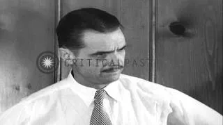 Howard Hughes rehearsing a statement to be broadcast  defending himself against  ...HD Stock Footage