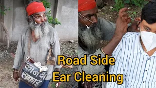 Roadside Ear Cleaning by Poor Barber