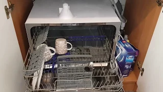dishwasher in a cupboard under the sink