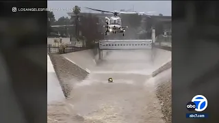 LA River rages as historic storm prompts dramatic rescues